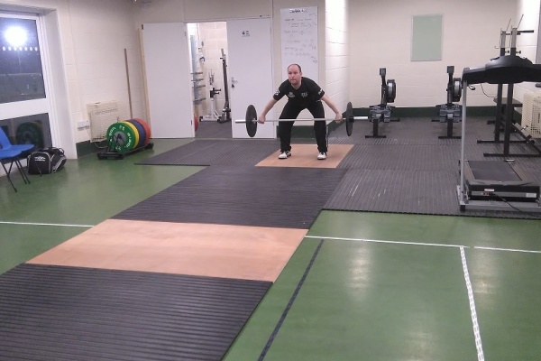 Head Coach Chris Green lifting 
